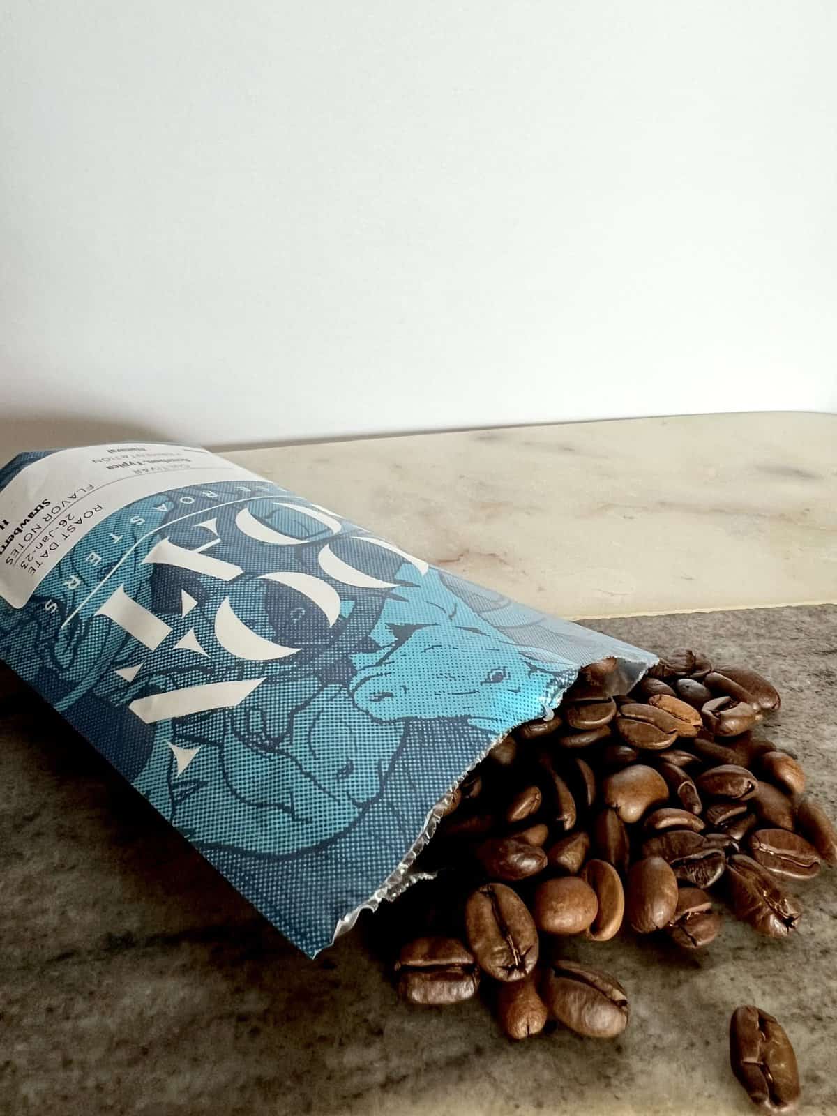 Bali-Natural-packaging-with-coffee-beans-next-to-it-scaled