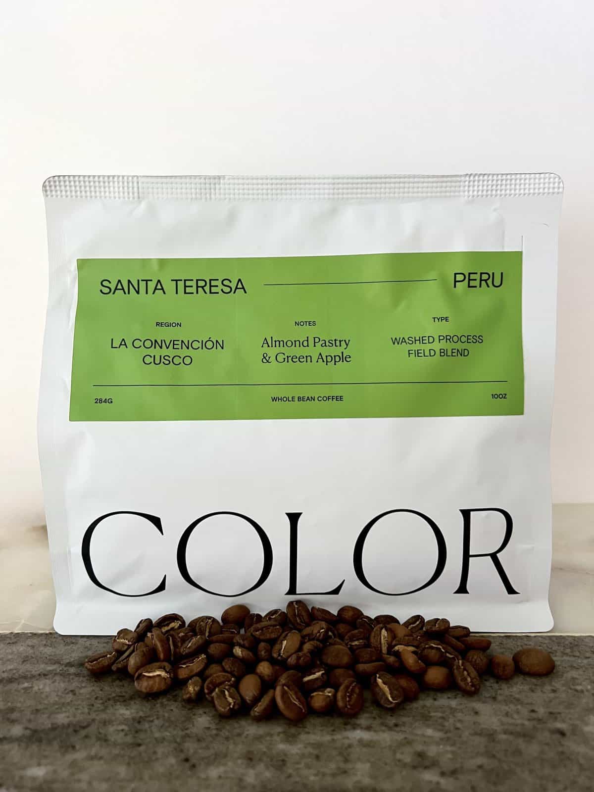 packaging-Santa-Teresa-Peru-coffee-stands-on-coffee-beans-scaled